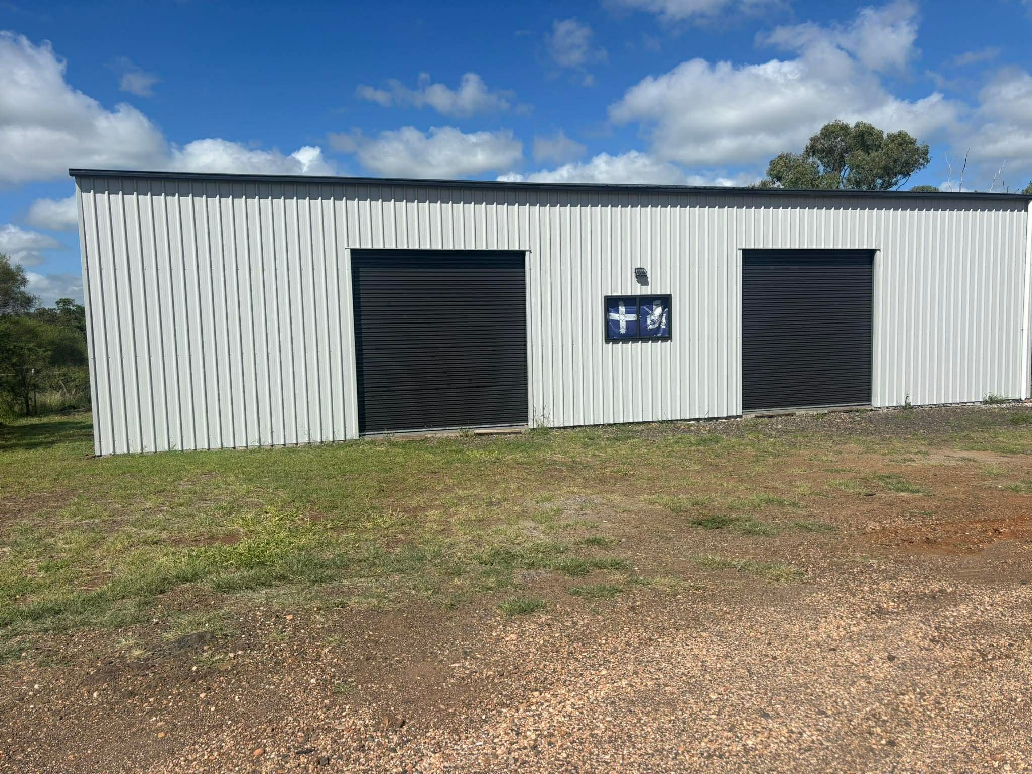 white-double-roller-door-garage-02
